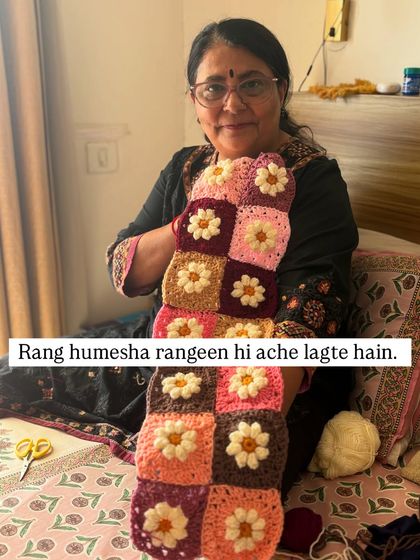 "Rang hamesha rangeen hi ache lagte hain." Colors always look good when they are colorful. Holding up a section of a daisy blanket, I am reminded of how much joy colors bring to my life and my work.
