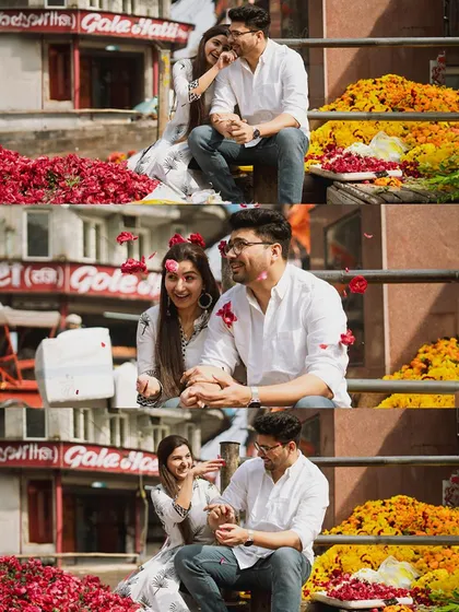 A fun, candid sequence of a couple playing with flower petals at a Delhi flower market during their pre-wedding session.