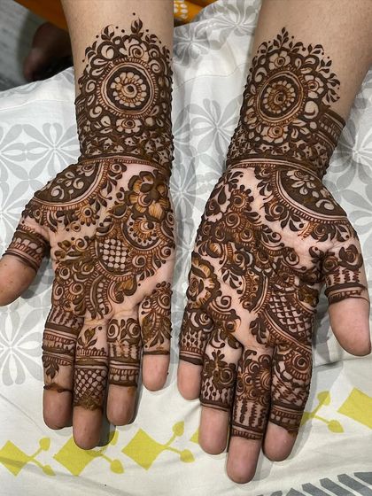 Intricate Full Hand Mehendi photo 12