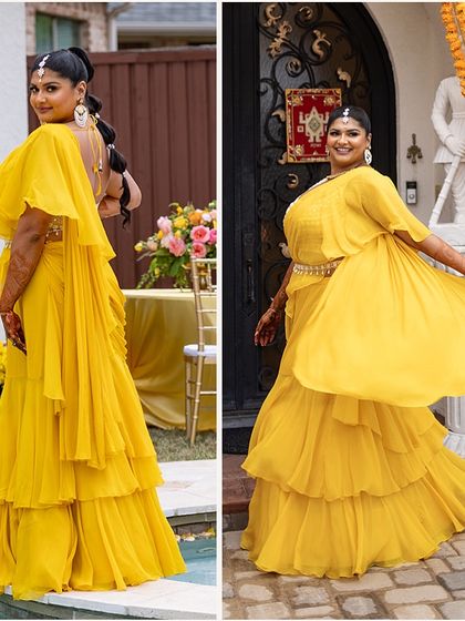 A full-length shot of the bride's tiered, ruffled yellow saree. The modern silhouette is a fresh and stylish take on traditional Haldi attire.