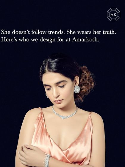 She doesn't follow trends. She wears her truth. This is who we design for at Amarkosh.