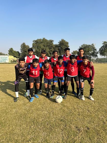 The opposing team from our friendly match. We believe in fostering sportsmanship and building connections within the football community.