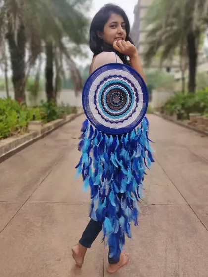 Protect your energy. Our large evil eye dreamcatcher is not just a beautiful piece of art; it's a powerful symbol to keep your space filled with positive vibes only.