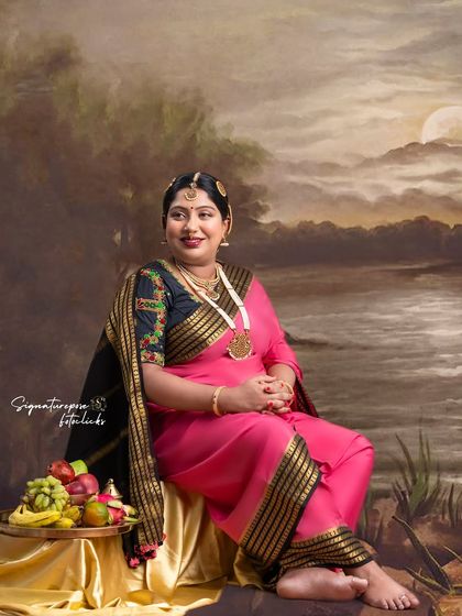 A similar pose with a painted backdrop of a moonlit lake, adding a touch of romance to the traditional theme.