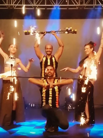 My fire crew posing after a show in Bangalore. We design and build custom pyrotechnic props like these, ensuring every performance at a wedding or private party is completely unique and visually spectacular.