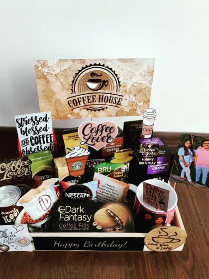 For the person who runs on caffeine, this coffee-themed hamper is the perfect pick-me-up. It's packed with various types of coffee, coffee-flavored treats, a mug, and fun coffee-lover quotes.