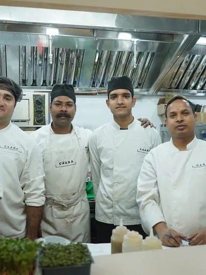 A group of our chefs at the pass, ready for service. Their teamwork and dedication are essential to creating the exceptional experiences our guests deserve.