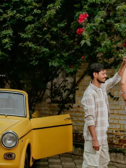 Fun and quirky moments with a vintage yellow car. This shoot shows how props can bring out a couple's playful side, making for unique and charming photos.
