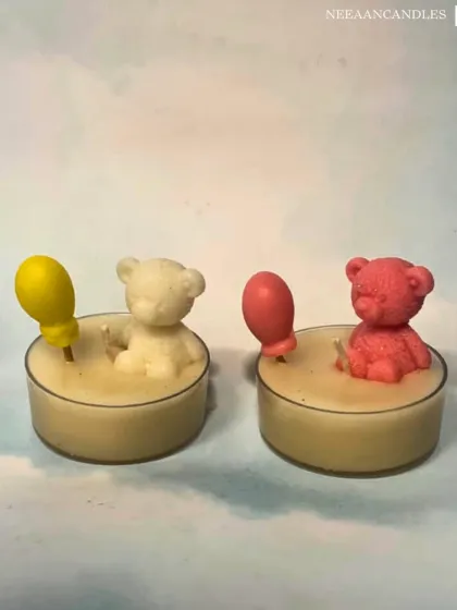 Light up your space with cuteness overload. Our handmade teddy bear tealight candles, holding a yellow or pink balloon, are perfect for gifting or adding a cozy touch.