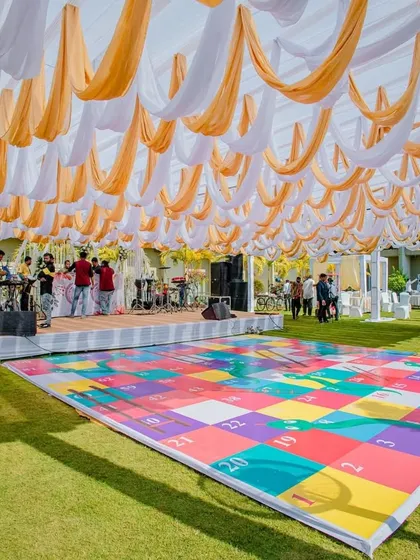 Another view of the giant snakes and ladders game, ready for guests to play during the daytime festivities.