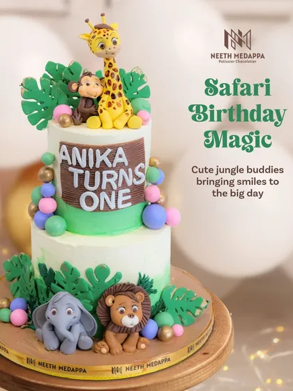 I love bringing the wild to a party! This two-tiered safari-themed cake for Anika's first birthday is full of handcrafted jungle friends like a friendly lion, elephant, monkey, and giraffe. The vibrant colors and playful details make it a centerpiece that sparks joy.