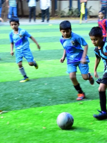 Players focused on the ball. We teach them to keep their eye on the game at all times.