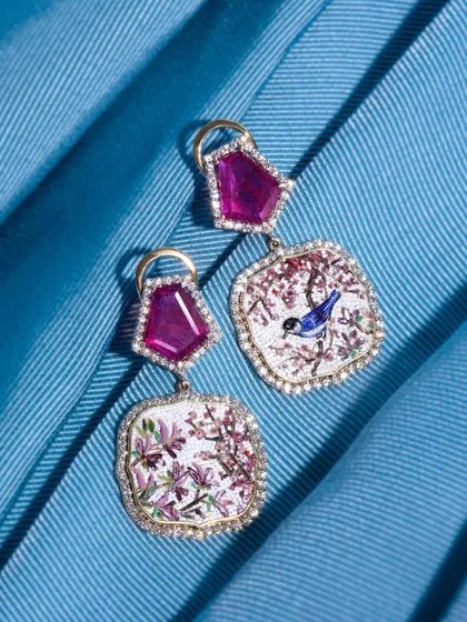 My Sakura-inspired micromosaic earrings, celebrating July as the month of rubies. One earring features a bluebird among the blossoms, while the other focuses on the delicate pink flowers.