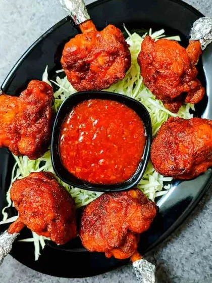 Our chicken lollipops are a classic starter. They are crispy, juicy, and served with a sweet and spicy dipping sauce that everyone loves.