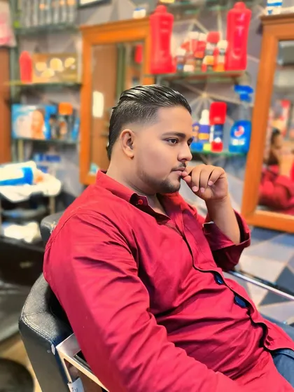 The finished look of the slicked-back undercut, showing its sharp lines and modern appeal.