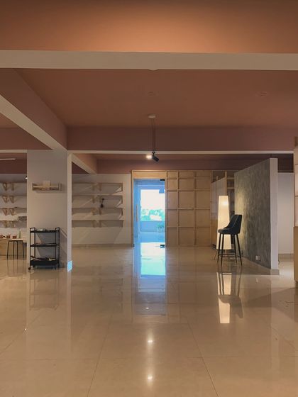 Another perspective of our studio, showing the clean lines and thoughtful layout. Every detail, from the lighting to the polished floors, was chosen to create a peaceful and professional environment for our artists.