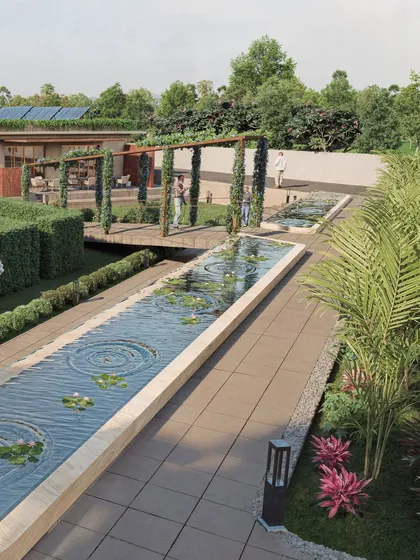 This rendering of the wellness center focuses on the serene water features, including a long channel with lily pads and a vine-covered pergola. The visualization aims to convey the tranquility and restorative purpose of the space.