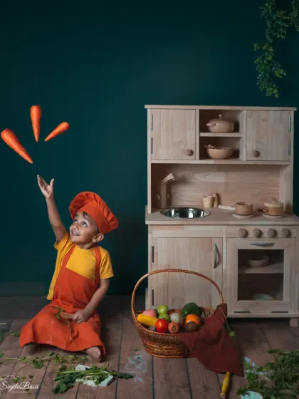 A themed birthday shoot for my son's fifth birthday, celebrating his love for books and cooking. Themed shoots are a wonderful way to capture your child's current passions and create a story around them.