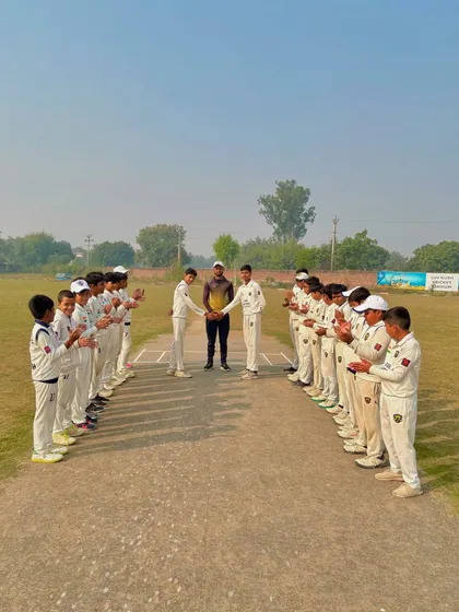 The toss for a practice match between two of our internal teams.