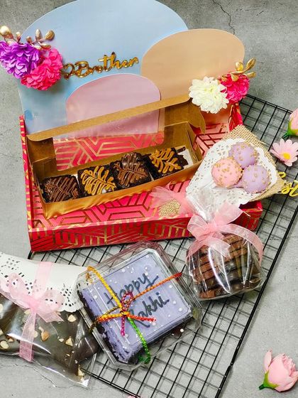 Because love is the secret ingredient in my Rakhi hampers! This one is overflowing with brownies, chocolate bark, cake pops, and a mini cake.