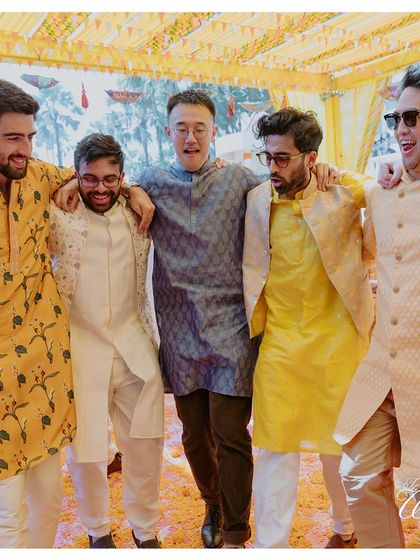 The groom and his squad sharing a moment of camaraderie. These friendships are a huge part of the wedding story, and I love capturing their energy.