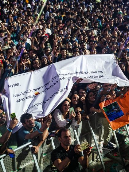 The voice of the fans. We create an environment where the audience is part of the show, celebrating their passion with banners and signs in the front rows.