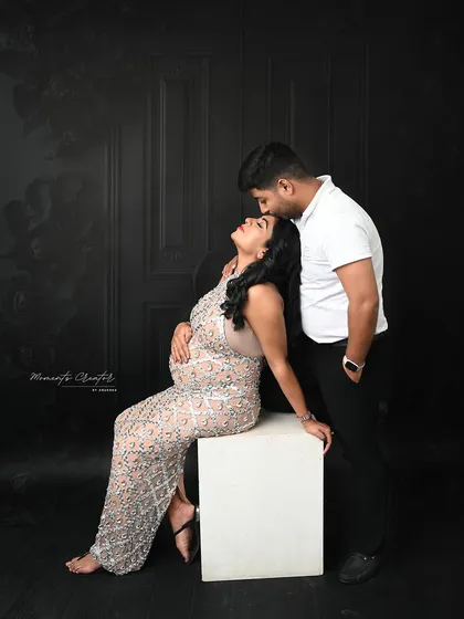 A tender forehead kiss is a simple yet powerful expression of love. I focus on capturing these small gestures that tell a big story about the couple's bond.