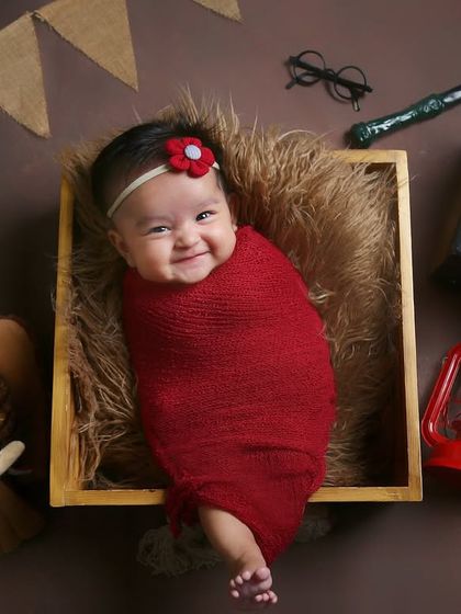 A happy smile from our little witch. Capturing these fleeting expressions during a themed shoot adds so much personality and joy to the final images.