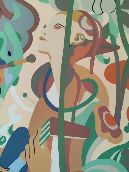 A close-up of a serene figure within the mural, showcasing the gentle and narrative quality of the artwork.