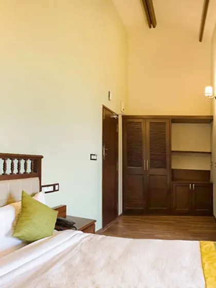 Your room is a sanctuary of calm. We've designed our accommodations to be simple, clean, and comfortable, with natural wood finishes and soft lighting to create a restful environment that supports your healing process.