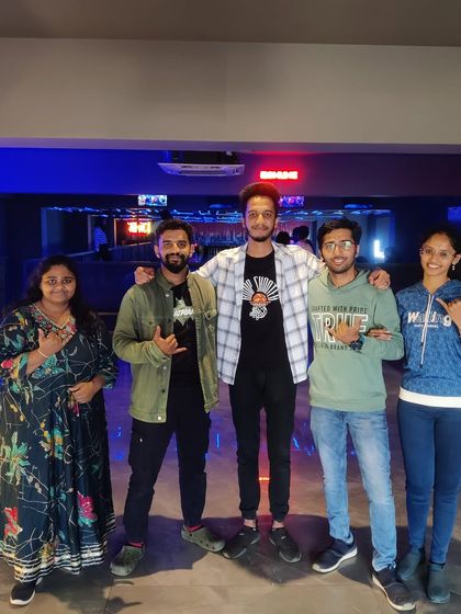 A group of friends posing for a photo at our venue.