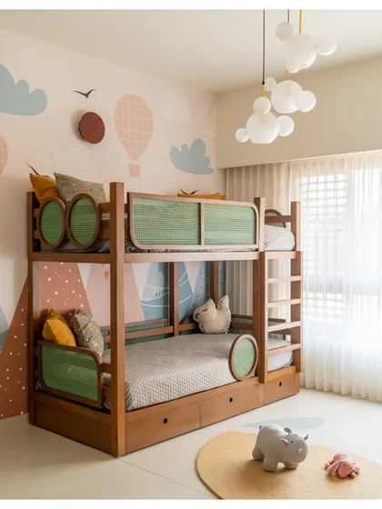 We had so much fun designing this playful and functional kids' room. The custom-designed bunk bed features green rattan panels and built-in storage, set against a whimsical pastel wallpaper with hot air balloons and clouds.
