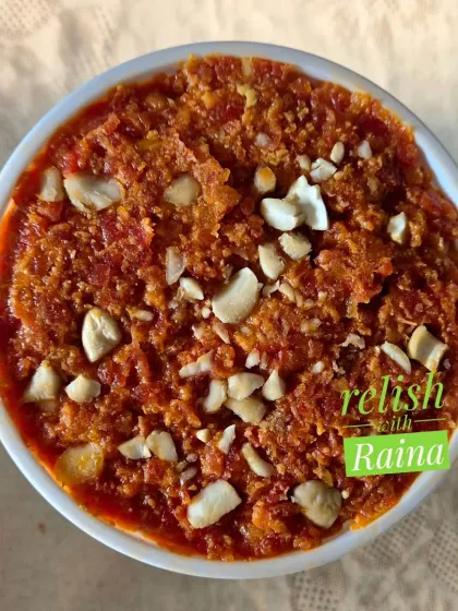 A close-up of my traditional Gajar ka Halwa, slow-cooked with fresh carrots, milk, and ghee. I garnish it generously with cashews for a rich, comforting dessert, perfect for winter celebrations.