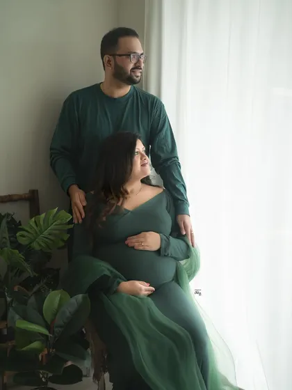 A shared moment looking towards the future. This couple's portrait uses natural light to create a hopeful and serene atmosphere.