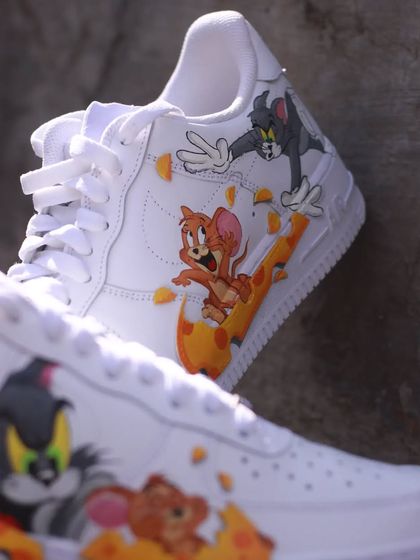 A close up of the outer side of the Tom & Jerry custom AF1.