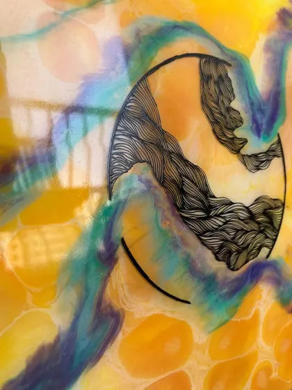 This is where my two loves meet: the fluid, glossy world of resin and the intricate detail of doodling. Adding these hand-drawn patterns makes each abstract piece deeply personal and one of a kind.