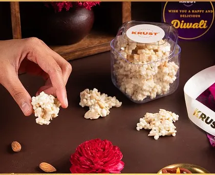 Our Almond White Rochers, a crunchy and sweet treat featured in our Diwali Almond Amour gift boxes. Perfect for those who love white chocolate.