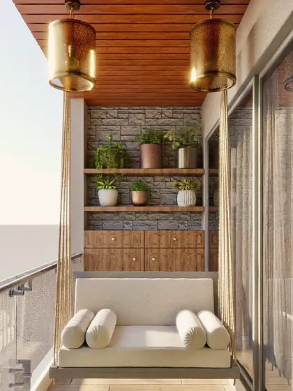 This cozy balcony design shows how even a small space can become a personal retreat. I used a custom swing sofa, a stone accent wall, and a variety of plants to create a perfect spot for relaxing with a view.