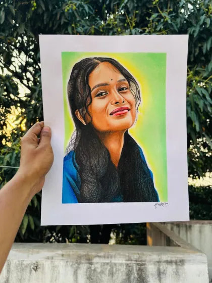 Capturing a warm smile and the light in someone's eyes is my passion. This vibrant color pencil portrait took over 50 hours, layering colors to get the skin tones just right and make the portrait pop. This is a great example of a commission from Mumbai.