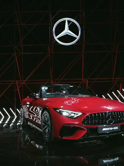 I set the stage for the Mercedes-AMG SL 55 launch. My goal here was to create a powerful, moody shot that highlights the car's aggressive design and the premium feel of the event, making the vehicle the star of the show.