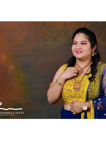 Had a wonderful shoot with this cutie. Her festive look features a bright pink lip and defined eyes, which look amazing with her vibrant yellow and blue outfit.