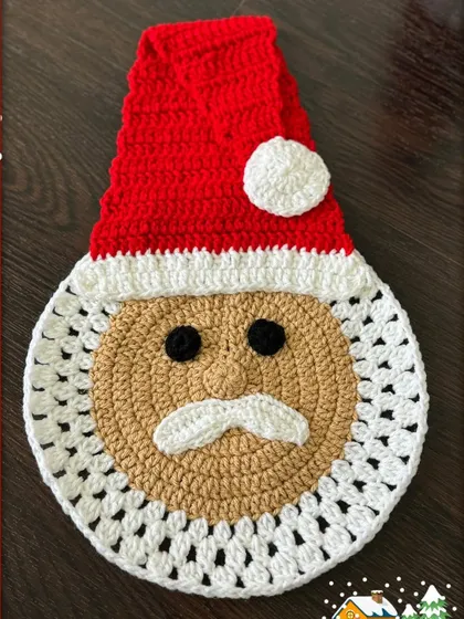 Get into the festive spirit with my adorable Santa placemat. It's a fun and functional piece that brings Christmas cheer to your dining table and is sure to get you compliments from your guests.