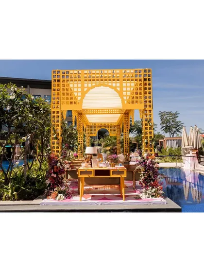I believe pre-wedding events should be just as spectacular as the main day. This vibrant, poolside Mehndi setup was designed to bring a bride's boho-chic dream to life, creating a perfect sundowner experience.