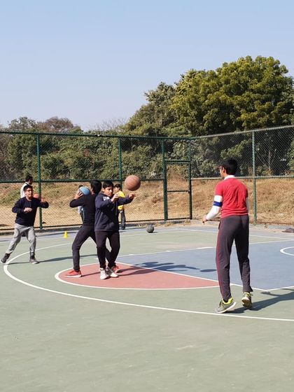 Passing is a critical team skill. In this drill, players practice making quick, accurate passes while on the move, learning to communicate and anticipate their teammates' positions on the court.