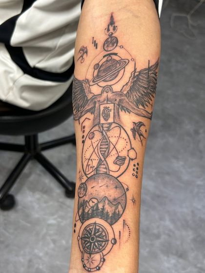 A close-up of the cosmic sleeve, highlighting the fine lines and delicate shading used to create this masterpiece.