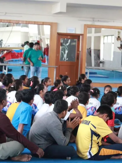 The audience of parents and fellow gymnasts at the Dasara selection event. The support of our community is invaluable.