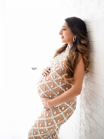 A three-quarter pose that feels soft and intimate. We'll cover a range of poses so you can provide a full and varied gallery to your clients.