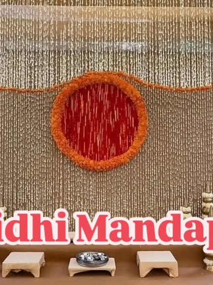 This Vidhi Mandap features a traditional design with a backdrop made entirely of jasmine strings (gajra). The central motif is created with orange marigolds, offering a classic and fragrant setting for the ceremony.