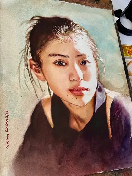 Another angle of the portrait on the easel, showing how the painting looks in a studio environment.
