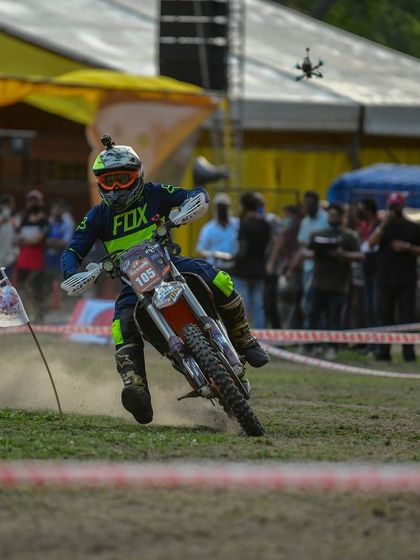 My drone hovering over the track at the Rally of Chamba, capturing the fastest rider as he speeds through the course.